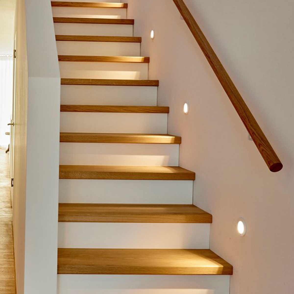 LED night light installed in a modern bedroom for soft ambient lighting.