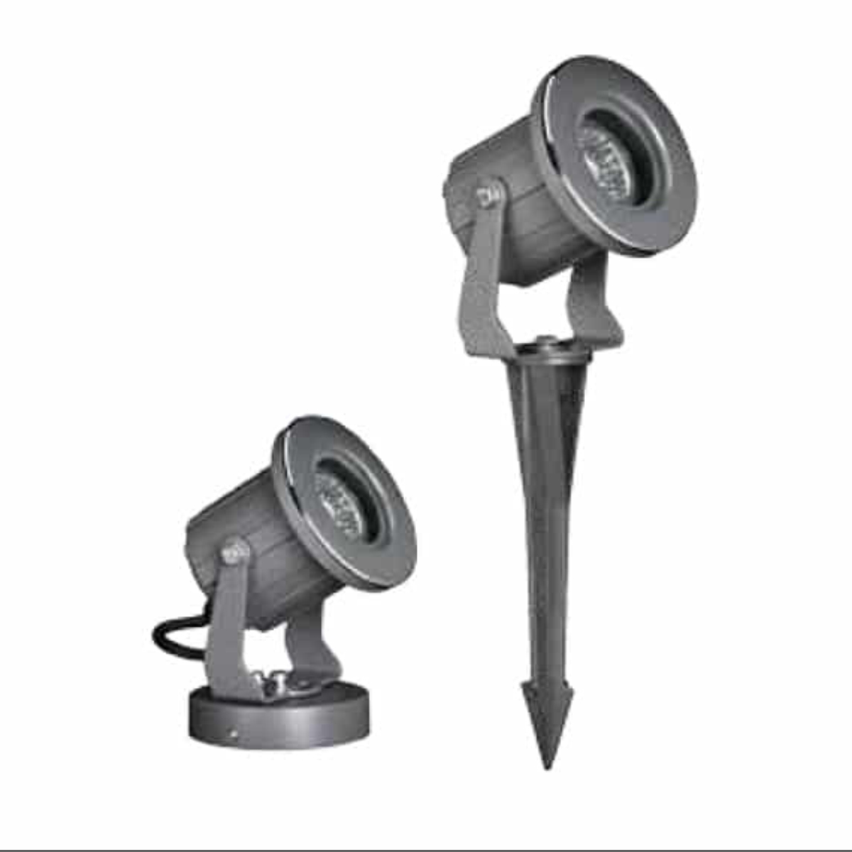 Close-up of the EST-J838110 Inground Spike Light installed in a modern landscape.